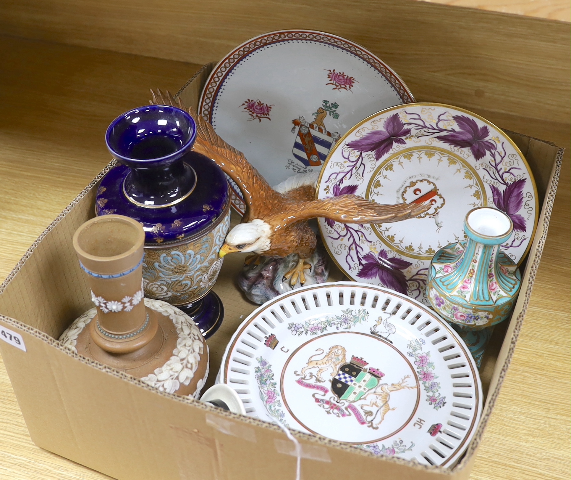 Two Doulton vases, a Beswick eagle, armorial plates, a vase and an advertising top hat